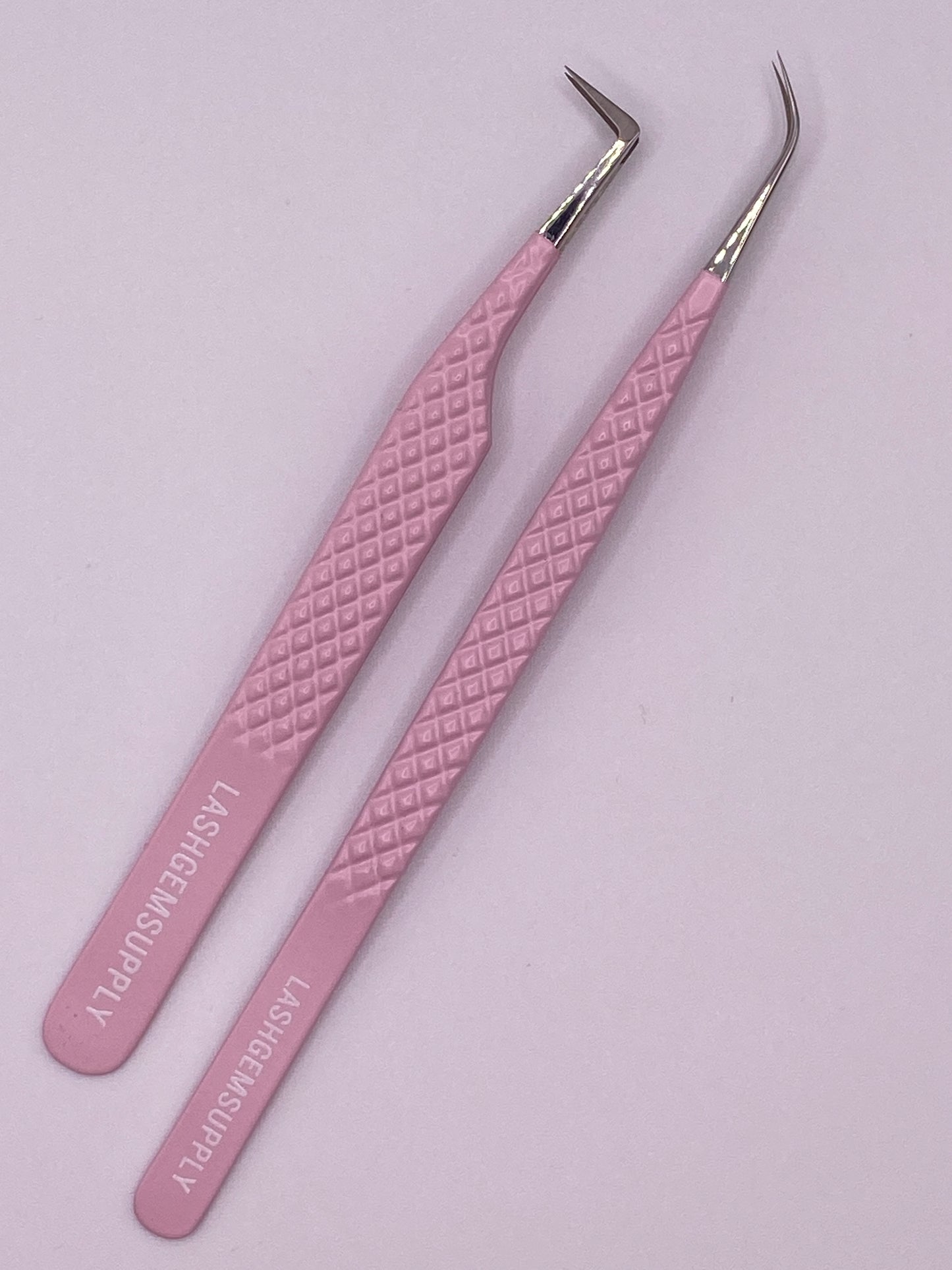 Baby pink tweezer duo